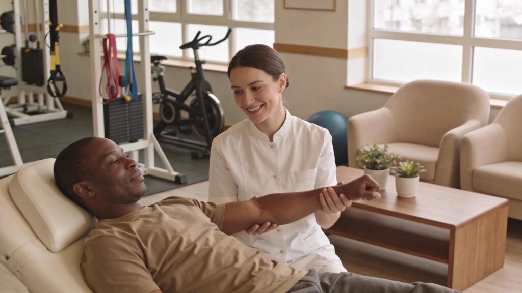 Physiotherapist providing care in a friendly clinic setting
