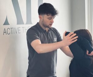 Jack treating patient at Active Therapy Clinic